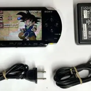 PSP WITH GAMES AND FULL ACCESSORIES