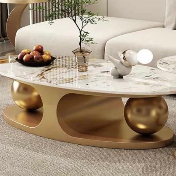 Modern oval coffee table with a marble or sintered stone top